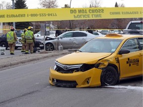 A taxi hijacking ends in a crash, a short foot chase and a man taken into custody near 64th Street and 32nd Avenue N.E. on February 17, 2015.