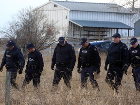 Calgary RCMP investigate a rural property near Carstairs after a fatal home-invasion shooting. The 67-year-old victim drove himself to hospital, where he died on Feb. 23, 2015.