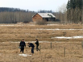 Calgary RCMP investigate a rural property near Carstairs on February 24, 2015, after a fatal home-invasion shooting. The 67-year-old victim was driven to hospital where he died on Feb. 23, 2015.