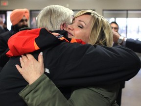 Incumbent Sandra Jansen got a hug from her boyfriend Neil Brown after the results of the PC nomination race for Calgary-North West were read at the Crowchild Twin Arenas on February 21, 2015. Jansen defeated her opponent Blair Houston to claim the nomination.