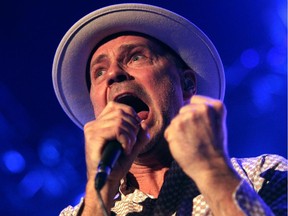 Tragically Hip lead singer Gordon Downie and members of the Canadian rock bank performed to a packed crowd at the Scotiabank Saddledome on February 9, 2015.