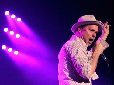 Tragically Hip lead singer Gordon Downie and members of the Canadian rock bank performed to a packed crowd at the Scotiabank Saddledome on February 9, 2015.