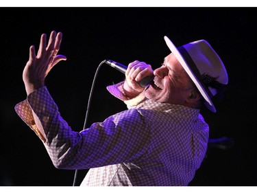 Tragically Hip lead singer Gordon Downie and members of the Canadian rock bank performed to a packed crowd at the Scotiabank Saddledome on February 9, 2015.