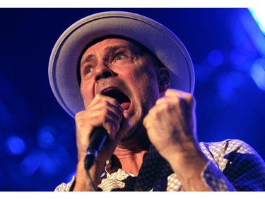 Tragically Hip lead singer Gordon Downie and members of the Canadian rock bank performed to a packed crowd at the Scotiabank Saddledome on February 9, 2015.