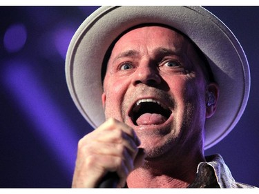 Tragically Hip lead singer Gordon Downie and members of the Canadian rock bank performed to a packed crowd at the Scotiabank Saddledome on February 9, 2015.