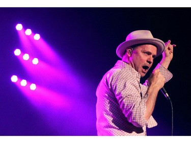 Tragically Hip lead singer Gordon Downie and members of the Canadian rock bank performed to a packed crowd at the Scotiabank Saddledome on February 9, 2015.