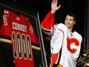 The Calgary Flames' Craig Conroy is honoured during a pre-game ceremony, marking his 1000th game, at the Scotiabank Saddledome in Calgary, Alberta Thursday, October 28, 2010.