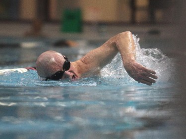 Philanthropist Jim Gray swims in the Eau Claire YMCA pool Thursday February 26, 2015 on the penultimate day of his 23-year, 300,000 plus length, swimming marathon. The Eau Claire Y is to be named the Gray Family Eau Claire YMCA in his honour.