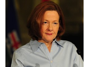 Premier Alison Redford announces her resignation in the main rotunda of the Alberta legislature in Edmonton, March 19, 2014.
