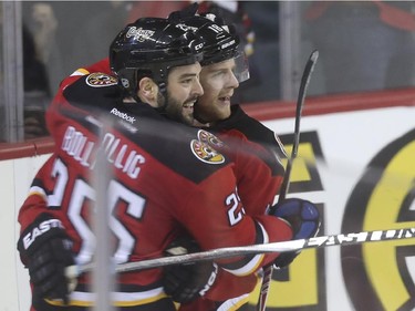 Calgary Flames' Matt Stajan celebrates his goal, the first goal of the game against the Anaheim Ducks, with team mate Brandon Boliig at the Saddledome in Calgary, on February 20, 2015.