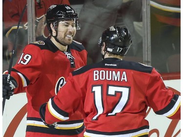 Calgary Flames David Jones, left, celebrates scoring a goal with Lance Bouma during game action against the Winnipeg Jets at the Saddledome in Calgary, on February 2, 2015.