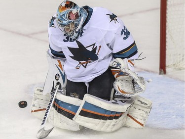 The Calgary Flames put three passed San Jose Sharks' goalie Alex Stalock during NHL action at the Saddledome in Calgary, on February 4, 2015.