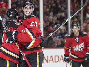 Calgary Flames Sean Monahan is all smiles after scoring his second goal against the Vancouver Canucks at the Saddledome in Calgary, on February 14, 2015.