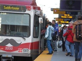 Passengers board a Saddletowne CTrain.