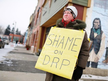Long-time High River resident Rita Geerlinks has been picketing the street in front of the Disaster Recovery Program offices in High River for 11 days to protest unfair treatment in her claim for compensation for her destroyed home in the town.