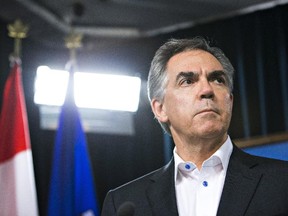 Alberta Premier Jim Prentice announces a 5 per cent wage cut to all cabinet ministers during a press conference in Edmonton on Thursday, January 29, 2015.