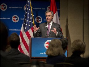 Premier Jim Prentice gestures during his keynote address at the U.S. Chamber of Commerce in Washington on Feb. 4, 2015. Prentice spoke about free trade and the importance of an integrated North America energy economy.