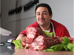 Second to None Meats' Simone Callegaro poses with blade roasts -- an economical offcut that makes for a tasty meal when treated with some time and tender loving care.