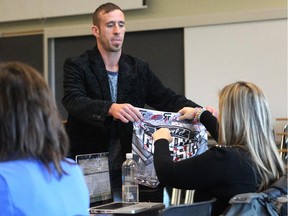Dragons' Den hopeful Ryan Fields showed off some of the underwear which he produces as he pitched to show producer Hannah James, right, in an audition for the CBC at Mount Royal University.