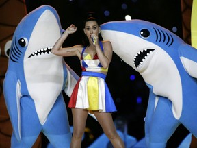 FILE - In this Feb. 1, 2015, file photo, singer Katy Perry performs during halftime of the NFL Super Bowl XLIX football game in Glendale, Ariz. The dancing sharks that stole some of the spotlight during Perry's Super Bowl halftime show have taken a bite out of an artist's bid to sell small figurines of them. (AP Photo/David J. Phillip, File)