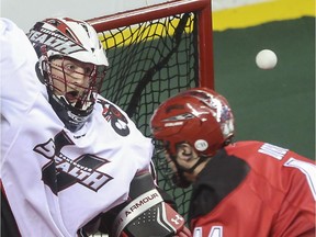 Calgary's Dane Dobbie fires a shot at Vancouver goalie Tyler Richards during a meeting last month. The Roughnecks lost their sixth-straight game of the season in Vancouver on Saturday night, 13-9.