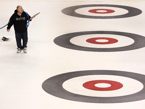 Head Ice Technician Jamie Bourassa was busy sealing the rings on the Brier ice surface as crews worked on preparing the Saddledome for the upcoming national men's curling championships on Sunday. The Brier play-in begins Thursday night before the draws begin on Saturday.