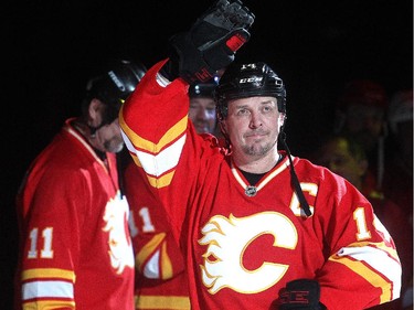 Former Calgary Flames star Theoren Fleury is introduced before the start of the Nathan O'Brien Children's Foundation hockey game Thursday February 5, 2015 at the Saddledome.