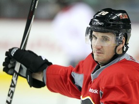 Calgary Flames left winger Curtis Glencross skated with teammates during training camp at the Scotiabank Saddledome on October 1, 2014.