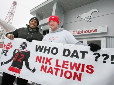 Calgary Stampeder Nik Lewis, left, with Brock Shepherd, the founder of the Nik Lewis Nation, a growing movement of Nik Lewis fans. The picture was taken in November 2010.