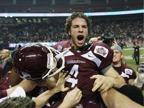 McMaster Marauders kicker Tyler Crapigna celebrates with teammates after their overtime 41-38 win of the 2011 Vanier Cup final between the McMaster Marauders and the Laval Rouge et Or in Vancouver. He is looking to carry that success into the CFL after signing with the Stampeders on Wednesday.