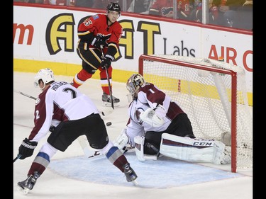 Calgary Flames left winger Johnny Gaudreau passes past the net at the Scotiabank Saddledome in Calgary on Monday, March 23, 2015. The Calgary Flames lead the Colorado Avalanche, 2-1, at the end of the second period in regular season NHL play.