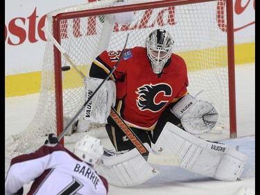 Colorado Avalanche defenceman Tyson Barrie misses a shot on Calgary Flames goalie Karri Ramo at the Scotiabank Saddledome in Calgary on Monday, March 23, 2015. The Calgary Flames lead the Colorado Avalanche, 2-1, at the end of the second period in regular season NHL play.