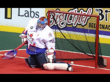 The Calgary Roughnecks score on Toronto Rock goaltender Nick Rose at the Scotiabank Saddledome in Calgary on Saturday, March 28, 2015. The Calgary Roughnecks tied with Toronto Rock, 5-5, at the half in regular season National Lacrosse League play.