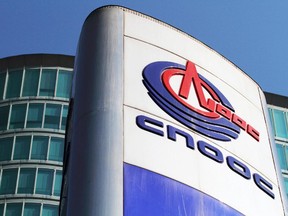 Signage at the headquarters of CNOOC (China National Offshore Oil Corporation) is shown in Beijing.