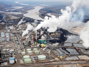 The aerial view shows the Suncor oilsands extraction facility near Fort McMurray, Alta.