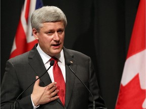 This November 14, 2015 file photo shows Canada's Prime Minister Stephen Harper as he speaks during a joint press conference with New Zealand's prime minister in Auckland.