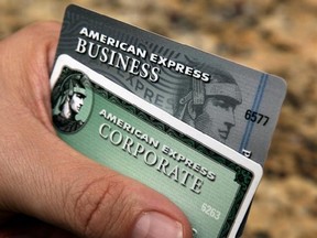 FILE - In this Jan. 20, 2010 file photo, American Express cards are posed for a photograph in Phoenix. Amex’s stock is down 11 percent this year, making it the second-biggest decliner on the Dow Jones industrial average. (AP Photo/Ross D. Franklin, File)