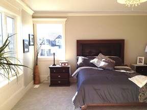 The master bedroom in the Sunstar Homes show home in Kinniburgh, Chestermere.