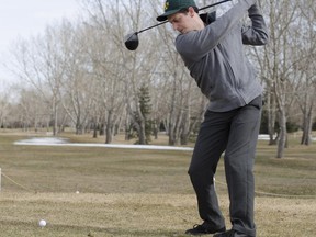 Adam Loblaw tees off on the opening day of Heather Glen Golf Club on April 2, 2013. With amazing temperatures, golfers will get a chance on March 13 to do the honours at the local course this year.