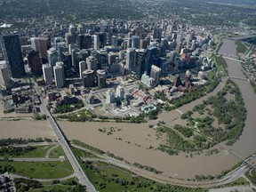 A flooded downtown Calgary is seen from a aerial view of the city on June 22, 2013.