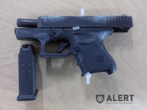 A Glock handgun loaded with 10 rounds of ammunition (pictured) and drugs with an estimated street value of $26,000 were seized on March 6, 2015, from Calgary homes by ALERT members.