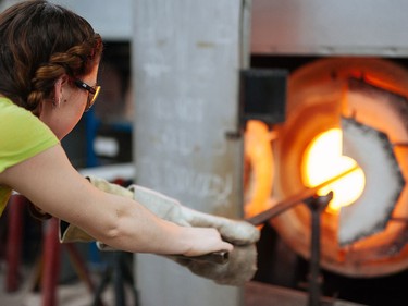 Melony Stieben working with the glass.