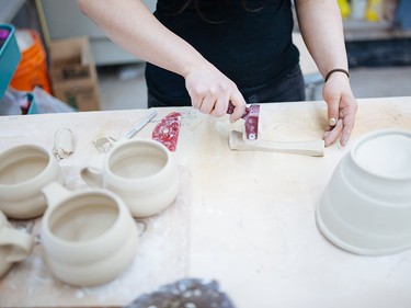 Mia Riley working on one of her pieces.