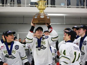 The Rocky Mountain Raiders hold up the fruits of their labour, the provincial Bantam AAA hockey championship after beating the Fort Saskatchewan Rangers 5-2 in the fifth-and-deciding game on Tuesday night.