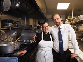 Danny and Maria Caria take a break from cooking in the kitchen at their Italian restaurant, Villa Maria, in the Beltline on Thursday, March 19, 2015.  Villa Maria was affected by the flood and then again by the condo fire next door, but they are still optimistic about the future. (Mikaela MacKenzie/Calgary Herald) (For  story by Laurence) 00063512A SLUG: 0228-Brier Skips