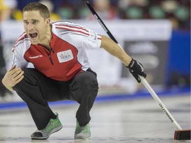 Team Canada skip John Morris watches after he releases a stone during a match against Team New Brunswick at the 2015 Tim Hortons Brier at the Saddledome in Calgary, on March 2, 2015.