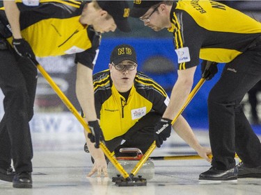 Team New Brunswick skip Jeremy Mallais watches after he releases a stone during a match against Team Canada at the 2015 Tim Hortons Brier at the Saddledome in Calgary, on March 2, 2015.