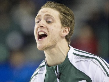 Team PEI skip Adam Casey yells at the sweepers during a match against Team Quebec at the 2015 Tim Hortons Brier at the Saddledome in Calgary, on March 2, 2015.