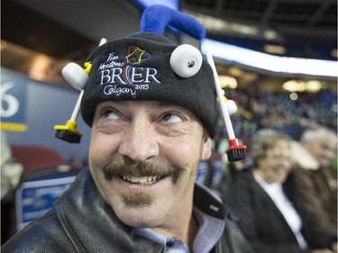 Jim Jepson wears his self decorated curling rock hat at the 2015 Tim Hortons Brier at the Saddledome in Calgary, on March 2, 2015.