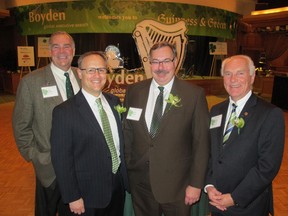 Cal 0404 Boyden 1  St. Patrick's Day just wouldn't be the same were it not for Boyden's annual Guinness & Green event held at the Calgary Petroleum Club. Pictured at the festive fete, from left,  are hosts with the most, Boyden partners  Tim Hamilton, Robert Travis, Kevin Gregor and Brent Shervey.